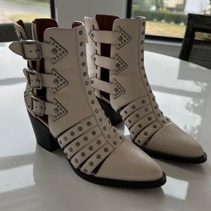 Coach booties in light cream, size 7. Worn twice. Excellent condition.